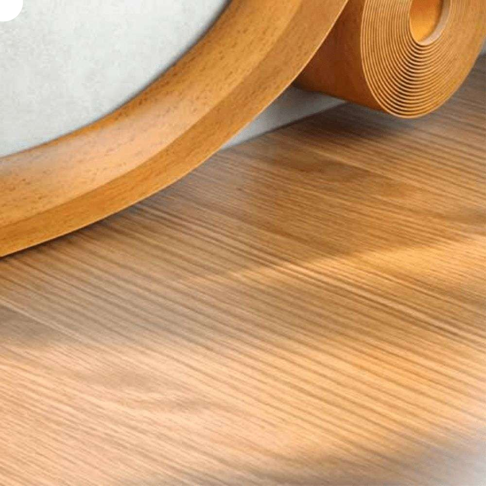 Wooden flooring roll on a wooden floor