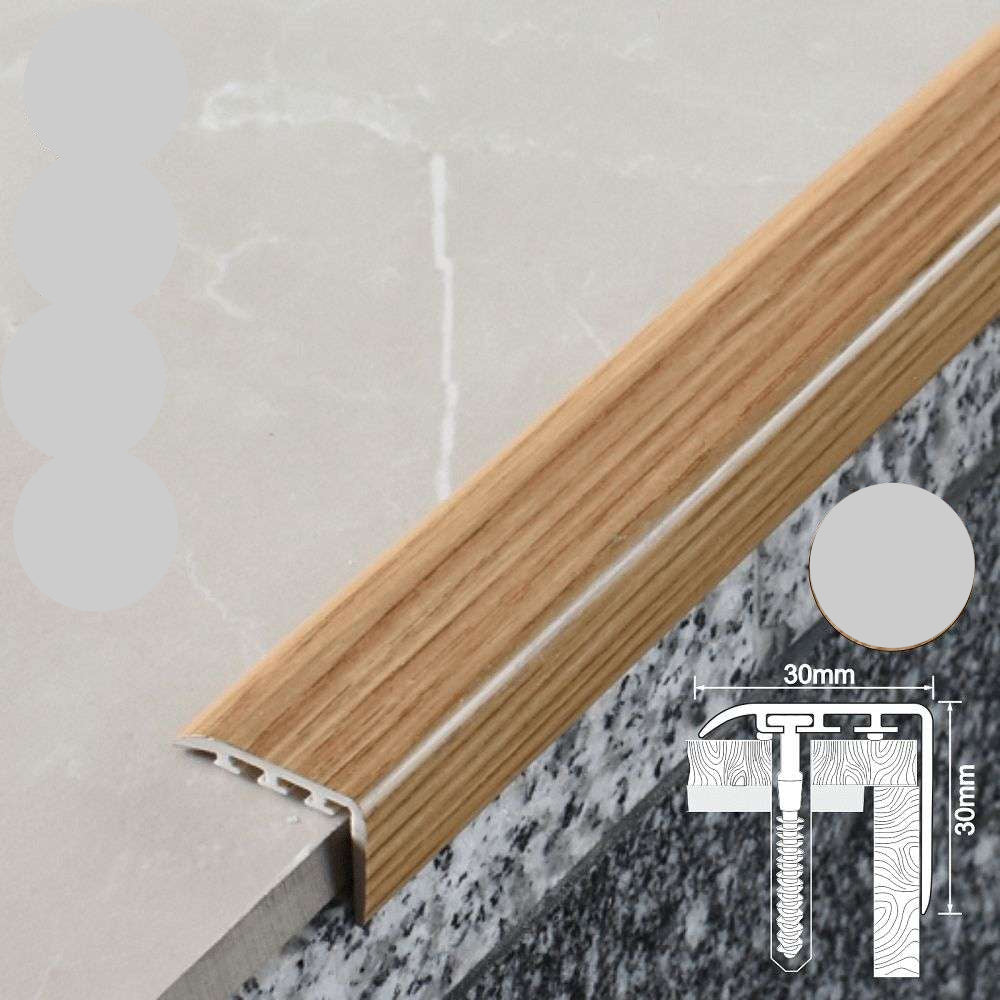 Wooden floor trim with UPVC label on a gray background